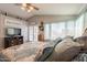 Comfortable bedroom with a king-size bed and access to a private balcony at 242 E Stonebridge Dr, Gilbert, AZ 85234
