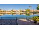 Waterfront homes with scenic lake views and reflections at 242 E Stonebridge Dr, Gilbert, AZ 85234