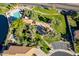 Aerial view showing pool, playground, and green areas at 242 E Stonebridge Dr, Gilbert, AZ 85234