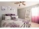 Charming bedroom with full-size bed and decorative shelving at 242 E Stonebridge Dr, Gilbert, AZ 85234