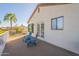 Private deck with two chairs and lake views at 242 E Stonebridge Dr, Gilbert, AZ 85234