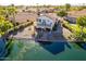 Waterfront home with deck and patio overlooking the lake at 242 E Stonebridge Dr, Gilbert, AZ 85234