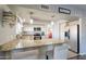 Spacious kitchen with granite countertops and stainless steel appliances at 242 E Stonebridge Dr, Gilbert, AZ 85234