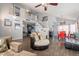 Spacious living area with hardwood floors, high ceilings and a cozy seating area at 242 E Stonebridge Dr, Gilbert, AZ 85234