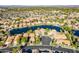Expansive aerial view of lake community at 242 E Stonebridge Dr, Gilbert, AZ 85234