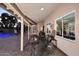 Outdoor patio area with pool, string lights, and seating at 5849 E Le Marche Ave, Scottsdale, AZ 85254