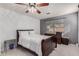 Spacious bedroom with a double bed and ceiling fan at 520 S Brett St, Gilbert, AZ 85296