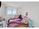 Cozy bedroom with full-size bed, and colorful decor at 8221 E Garfield St # L09, Scottsdale, AZ 85257