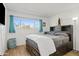Main bedroom with a large bed, window, and plenty of natural light at 8221 E Garfield St # L09, Scottsdale, AZ 85257