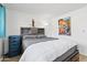 Main bedroom with a queen bed and ample storage at 8221 E Garfield St # L09, Scottsdale, AZ 85257