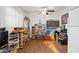 Spacious studio features built-in shelving and hardwood floors at 8221 E Garfield St # L09, Scottsdale, AZ 85257