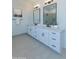 Stylish main bathroom featuring dual vanities, modern fixtures, and ample counter space at 4550 N 192Nd Dr, Litchfield Park, AZ 85340