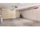 Two-car garage with overhead storage at 15768 W Vale Dr, Goodyear, AZ 85395