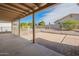 Covered patio with brick pavers, offering an outdoor entertaining space at 725 S 81St Pl, Mesa, AZ 85208