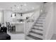 Modern kitchen with white cabinets and an island at 4636 E Tierra Buena Ln, Phoenix, AZ 85032