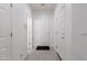 Bright entryway with wood-look tile flooring and white walls at 4636 E Tierra Buena Ln, Phoenix, AZ 85032