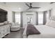Main bedroom with large bed and comfortable seating at 4636 E Tierra Buena Ln, Phoenix, AZ 85032