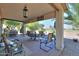 Covered patio with seating area, overlooking a golf course at 2414 E Antigua Dr, Casa Grande, AZ 85194