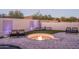 Relaxing fire pit area with comfortable seating and lighting at 1808 W Horsetail Trl, Phoenix, AZ 85085