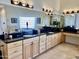 Double vanity bathroom with granite countertops and ample storage at 2222 N Val Vista Dr # 3, Mesa, AZ 85213