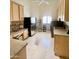 Laundry room with washer, dryer, sink, and cabinets at 2222 N Val Vista Dr # 3, Mesa, AZ 85213