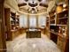 Large home office with built-in bookcases and desk at 2222 N Val Vista Dr # 3, Mesa, AZ 85213