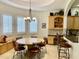 Breakfast nook in kitchen with round table and built-in seating at 2222 N Val Vista Dr # 3, Mesa, AZ 85213