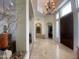 Spacious entryway with high ceilings and a beautiful chandelier at 2222 N Val Vista Dr # 3, Mesa, AZ 85213