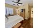 Spacious bedroom with wood floors and a large window at 2222 N Val Vista Dr # 3, Mesa, AZ 85213