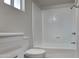 Clean bathroom with white tiled shower/tub combo at 887 W Shannon St, Chandler, AZ 85225