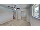 Bedroom with mirrored closet and ceiling fan at 887 W Shannon St, Chandler, AZ 85225