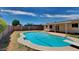 Inviting kidney-shaped pool with diving board at 887 W Shannon St, Chandler, AZ 85225