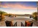 Luxury pool and spa with sunset mountain views at 10831 N Pulve Ct, Fountain Hills, AZ 85268