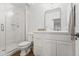 Clean bathroom with a walk-in shower and white vanity at 5245 N 21St St, Phoenix, AZ 85016