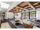 Bright living room with high ceilings, exposed beams, and comfortable seating at 5245 N 21St St, Phoenix, AZ 85016