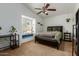 Bedroom with a window seat and ceiling fan at 12535 N 87Th Dr, Peoria, AZ 85381