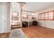 Living room with hardwood floors and staircase at 12535 N 87Th Dr, Peoria, AZ 85381