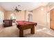 Spacious game room with a pool table and plenty of room at 12535 N 87Th Dr, Peoria, AZ 85381