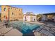 Refreshing community pool with ample lounge chairs and seating at 158 W Commerce Ct, Gilbert, AZ 85233
