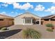 Charming backyard with gravel landscaping and a patio at 21613 N 261St Ave, Buckeye, AZ 85396