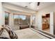 Main bedroom with bay windows and ensuite bathroom access at 21613 N 261St Ave, Buckeye, AZ 85396