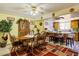 Charming dining area with wood table and chairs, open to the kitchen at 3901 W Solano N Dr, Phoenix, AZ 85019