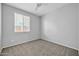 Bedroom with two windows and ceiling fan at 13115 W Tether Trl, Peoria, AZ 85383