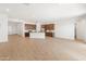 Open concept kitchen with island, stainless steel appliances, and granite countertops at 24741 N 175Th Dr, Surprise, AZ 85387