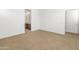 Bright bedroom with neutral walls and carpeting at 24741 N 175Th Dr, Surprise, AZ 85387