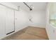 Attached garage with overhead door and extra storage space at 24741 N 175Th Dr, Surprise, AZ 85387