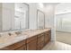 Double vanity bathroom with granite countertop at 24741 N 175Th Dr, Surprise, AZ 85387