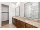 Bathroom with double vanity and granite countertop at 24741 N 175Th Dr, Surprise, AZ 85387
