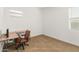 Bright home office features a desk, chair, and large window at 24741 N 175Th Dr, Surprise, AZ 85387