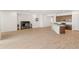 Spacious living area with wood-look tile floors and lots of natural light at 24741 N 175Th Dr, Surprise, AZ 85387